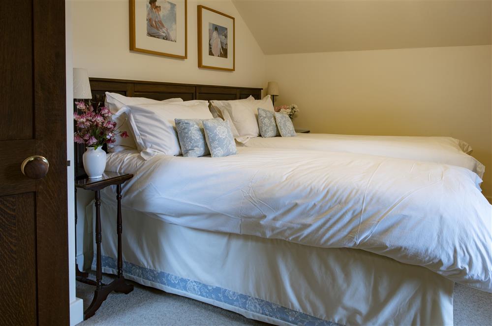Bedroom two with twin 2’6 zip and link beds at Glassonby Old Hall and Jennys Croft, Glassonby