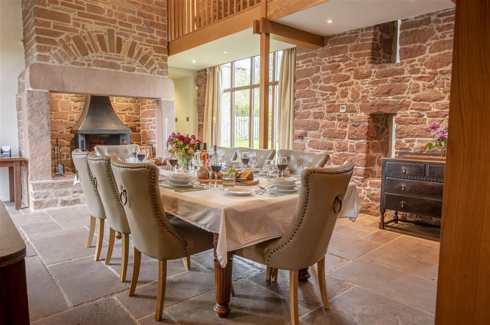 Stunning galleried dining room with sandstone flagged floor and exposed beams at Glassonby Old Hall and Jennys Croft, Glassonby