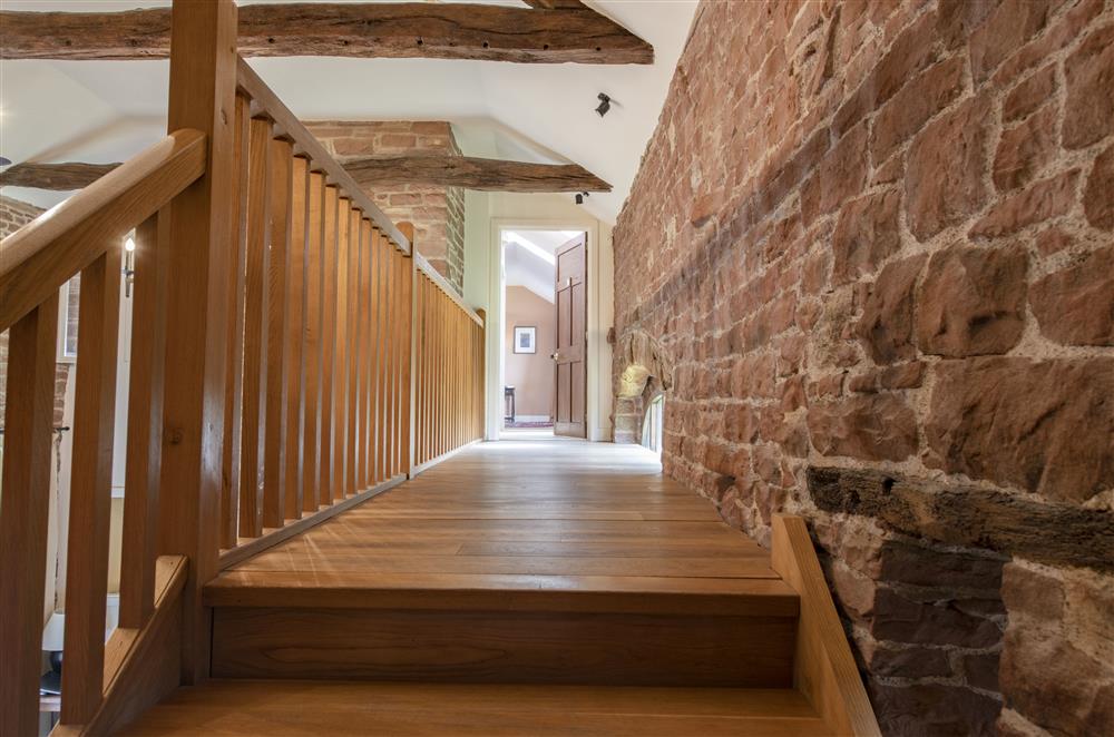 The galleried landing overlooking the dining room and leading to bedroom one at Glassonby Old Hall and Jennys Croft, Glassonby