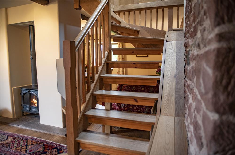 Wooden staircase leading to the first floor at Glassonby Old Hall and Jennys Croft, Glassonby