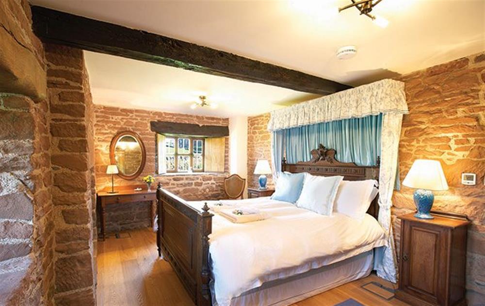 Double bedroom with 5’ king size bed at Glassonby Old Hall, Glassonby