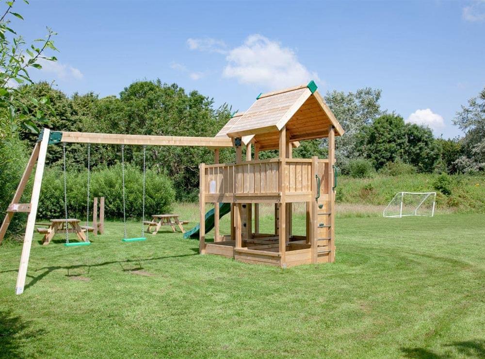 Children’s play area at Glastonbury in Witham Friary, Frome, Somerset., Great Britain
