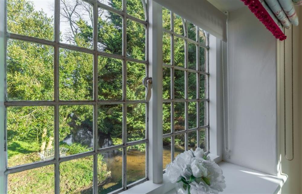 First floor: Garden views from the master bedroom at Glaven Cottage, Letheringsett near Holt