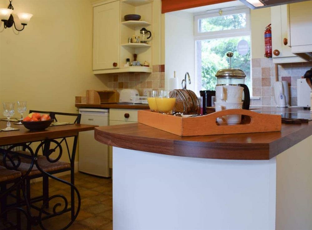 Modest kitchen area with breakfast bar at Glebe Cottage in Scone, Nr Perth, Perthshire., Great Britain