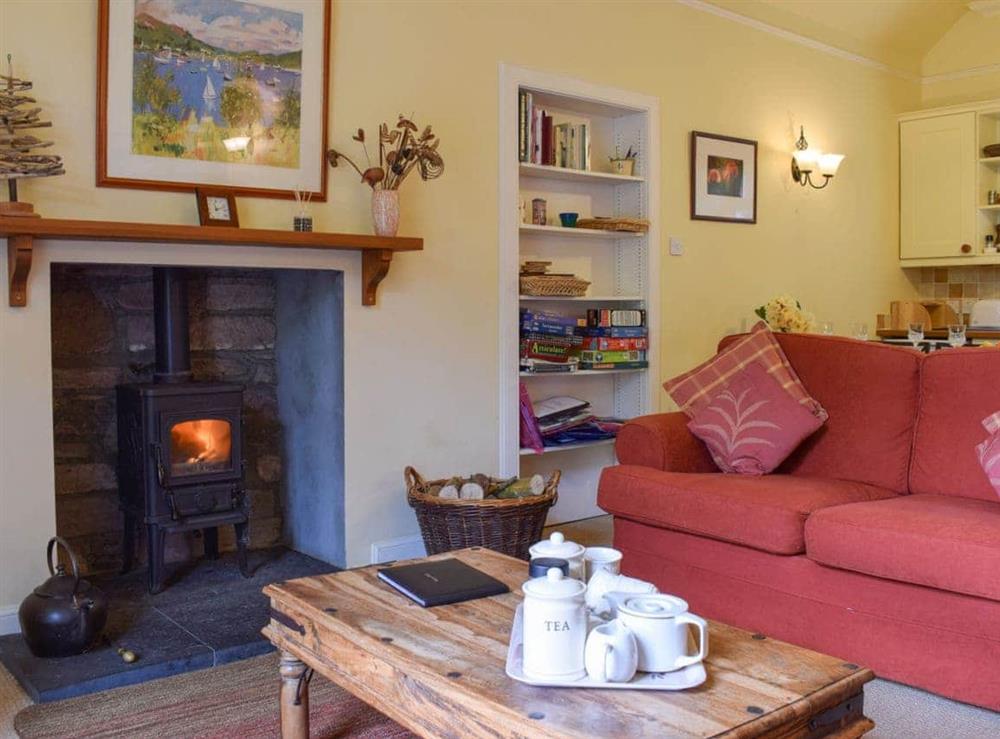 Warm and welcoming living area with wood burner at Glebe Cottage in Scone, Nr Perth, Perthshire., Great Britain