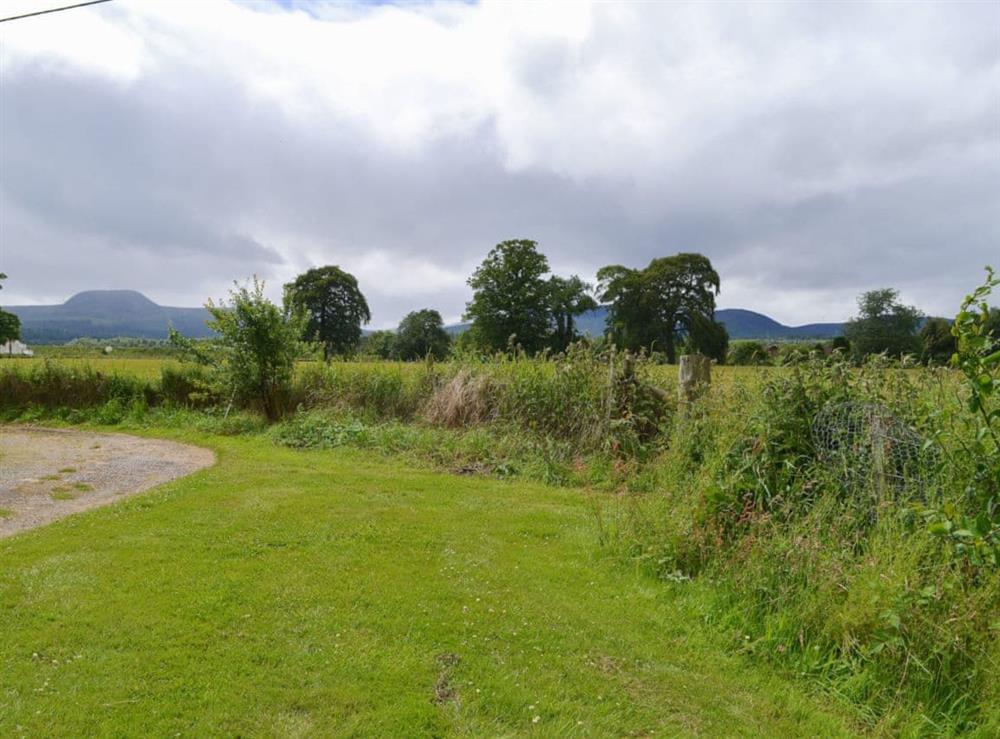 Far-reaching views over the surrounding farmland at Glebe Cottage in Urray, near Dingwall, Highlands, Ross-Shire