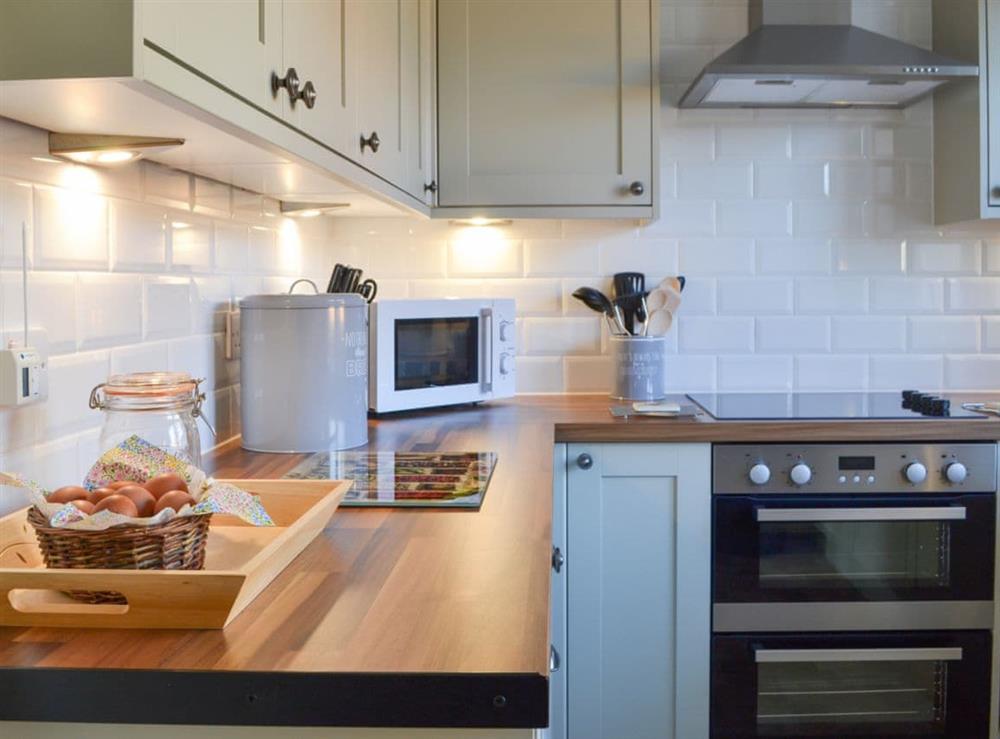 Fully equipped kitchen at Glebe Cottage in Urray, near Dingwall, Highlands, Ross-Shire
