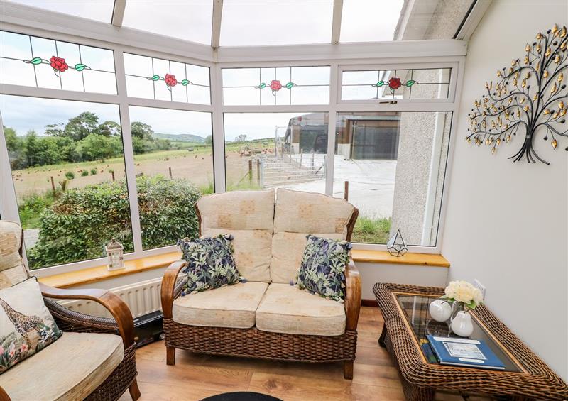 Relax in the living area at Glebe Farm Cottage, Rathfriland