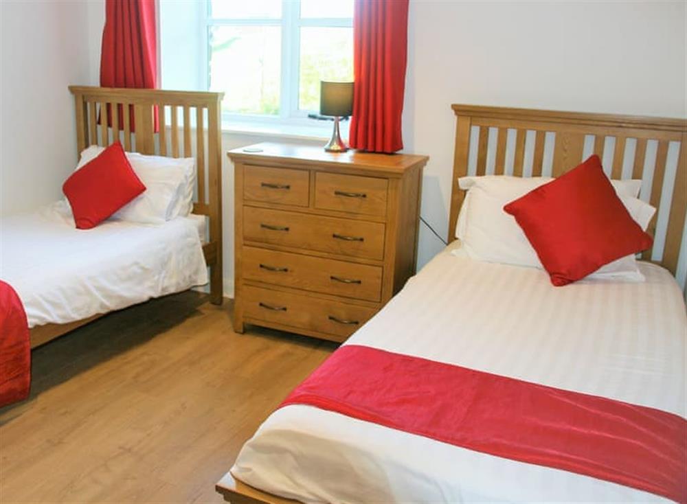 Twin bedroom at Poachers Cottage, 
