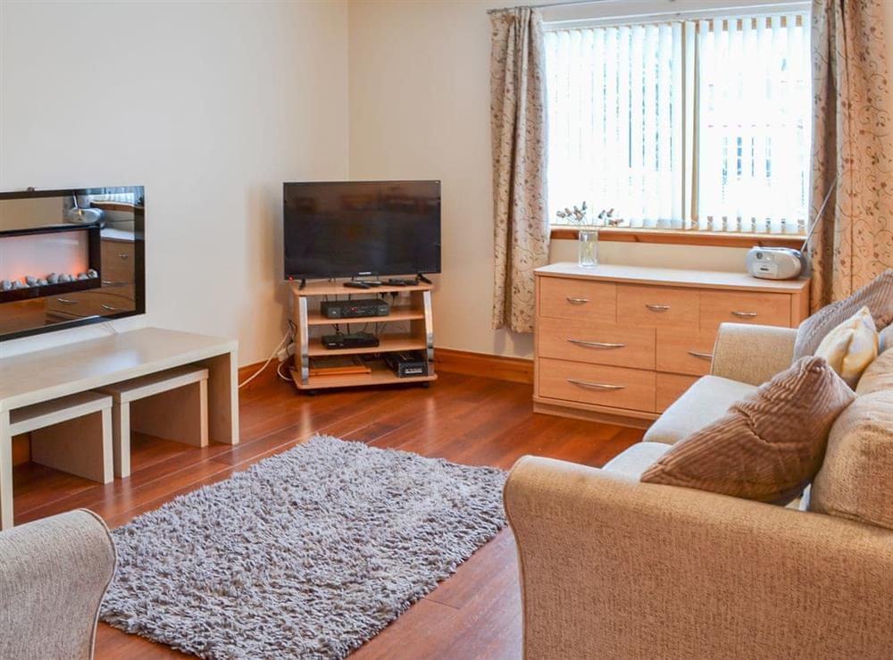 Spacious living area at Glen Apartment in Aviemore, Inverness-Shire