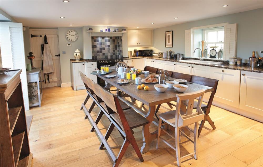 Large well-equipped Kitchen/Breakfast Room seating 10 guests and wonderful views onto the courtyard and garden