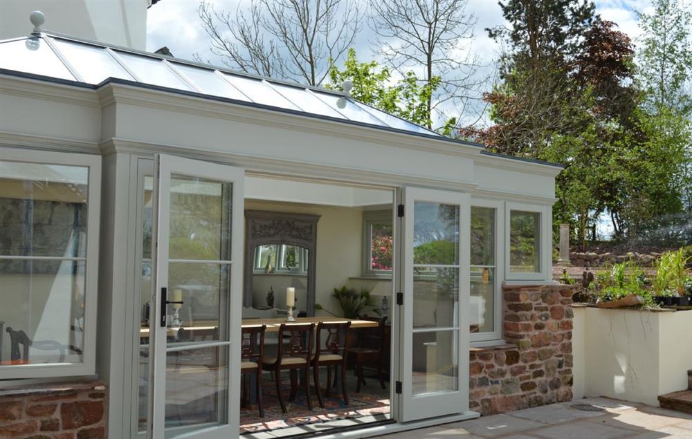 The impressive Orangery brings the outdoors in with large bi-fold doors that open on to the garden and courtyard (photo 3)