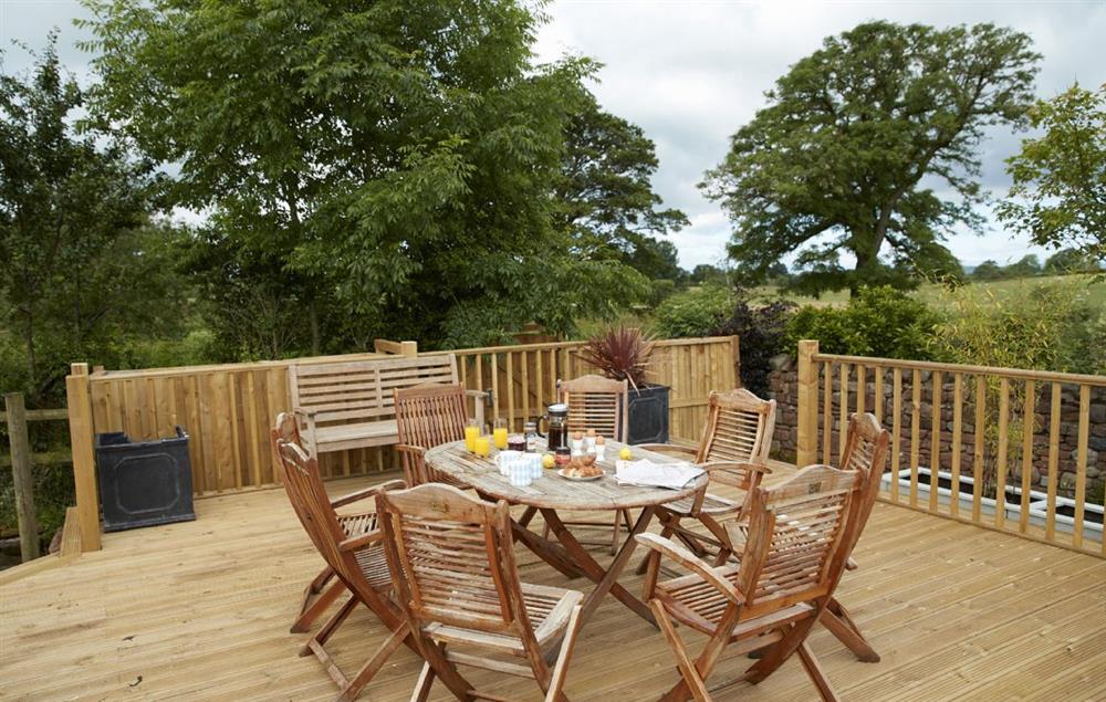 The raised deck is a perfect spot for breakfast at Glen Bank, Appleby-in-Westmoreland