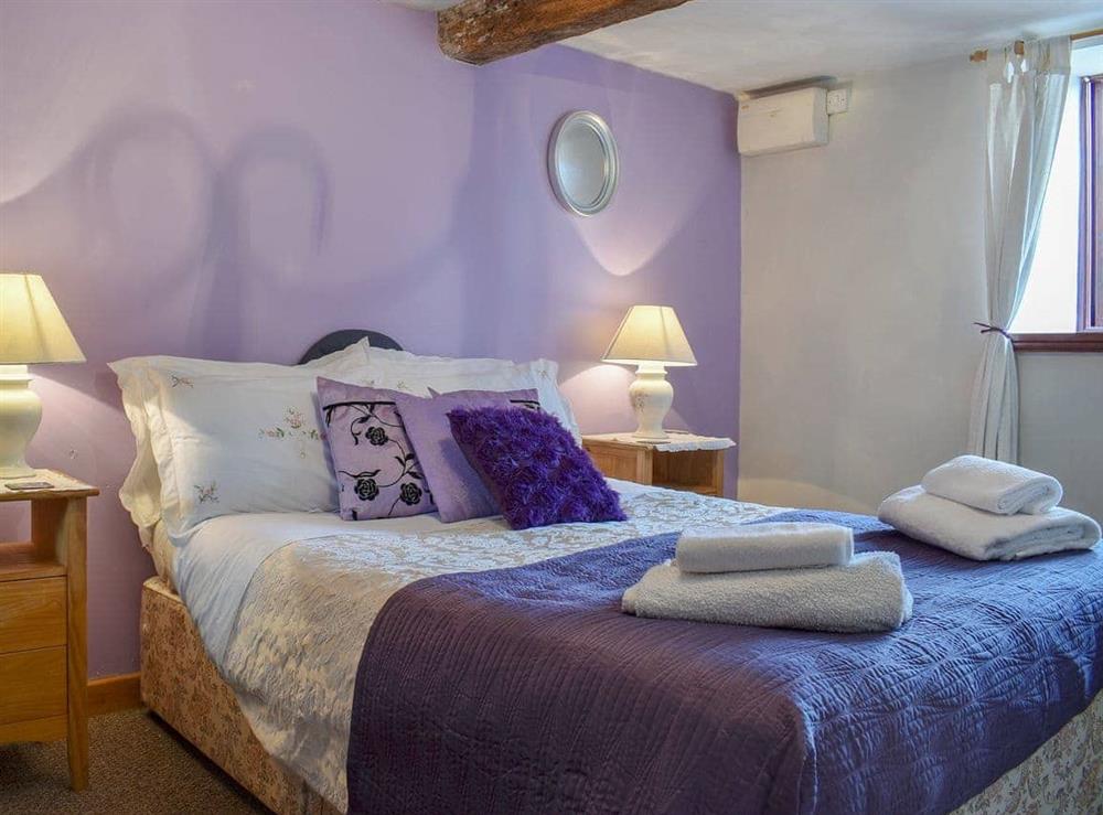 Charming double bedroom with beams at Glen Cottage in Marstow, near Ross-On-Wye, Herefordshire