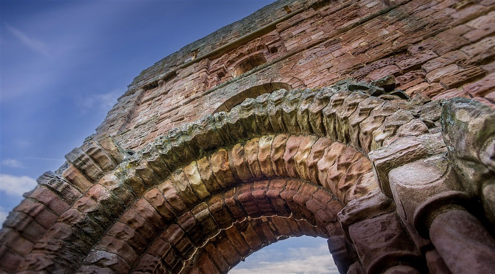 An archway in the ruins of Lindisfarne Priory on Holy Island, near Glen House, Northumberland at Glen House in Berwick-upon-tweed, Northumberland