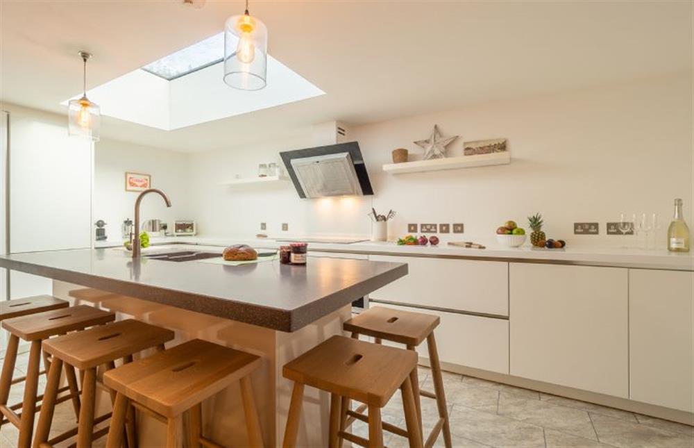 Well-equipped kitchen with island at Glencairn House, Thorpeness