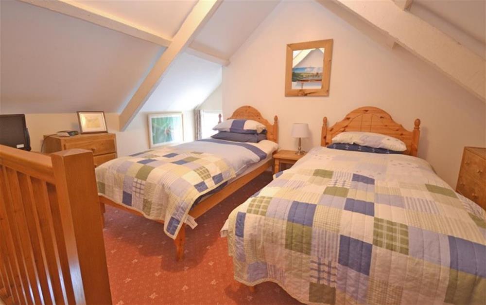 The attic twin bedroom at Glencoe Cottage in Polperro