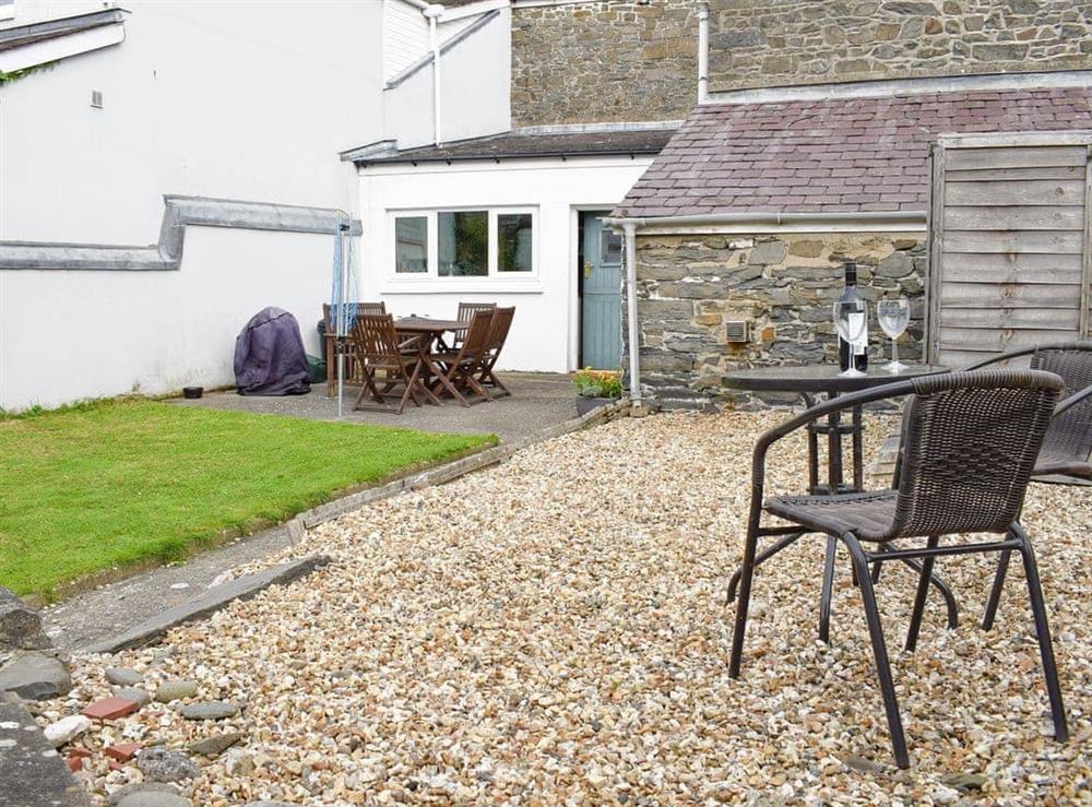 Enclosed garden and patio at Glendower in Aberaeron, Dyfed