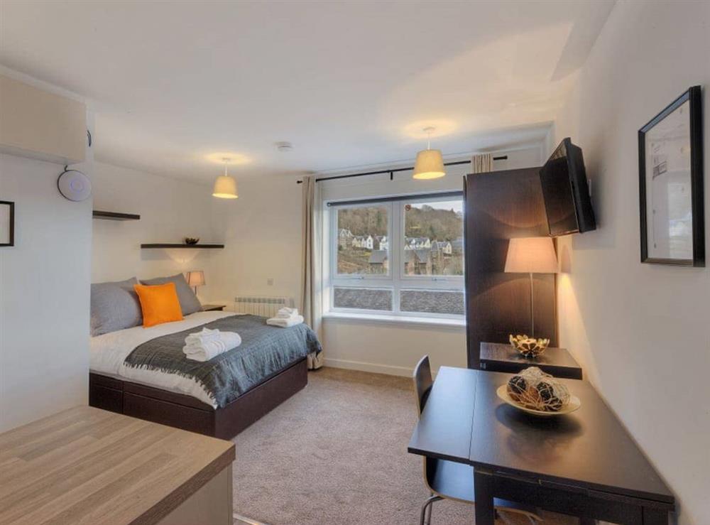 Open plan living space (photo 4) at Glenfarclas Apartment in Oban, Argyll