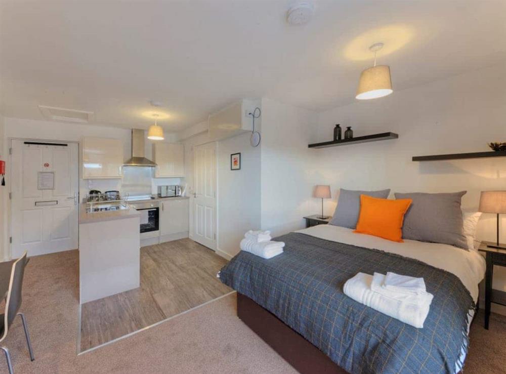 Open plan living space at Glenfarclas Apartment in Oban, Argyll