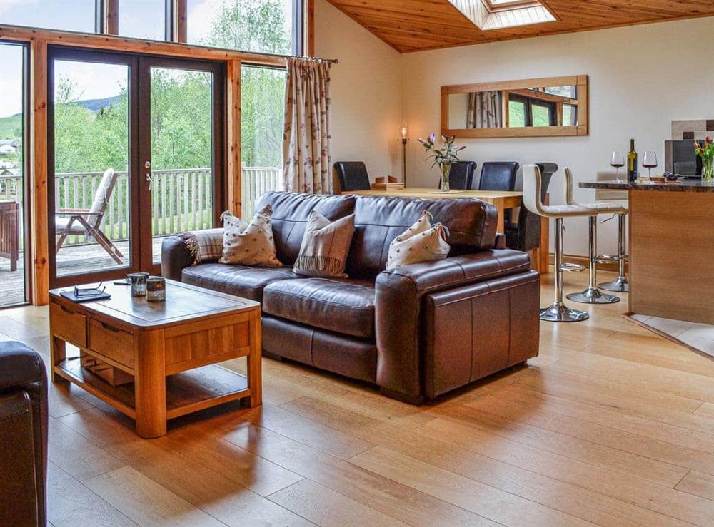 Open plan living space at Glengoulandie Lodge in Glengoulandie, near Aberfeldy, Perthshire