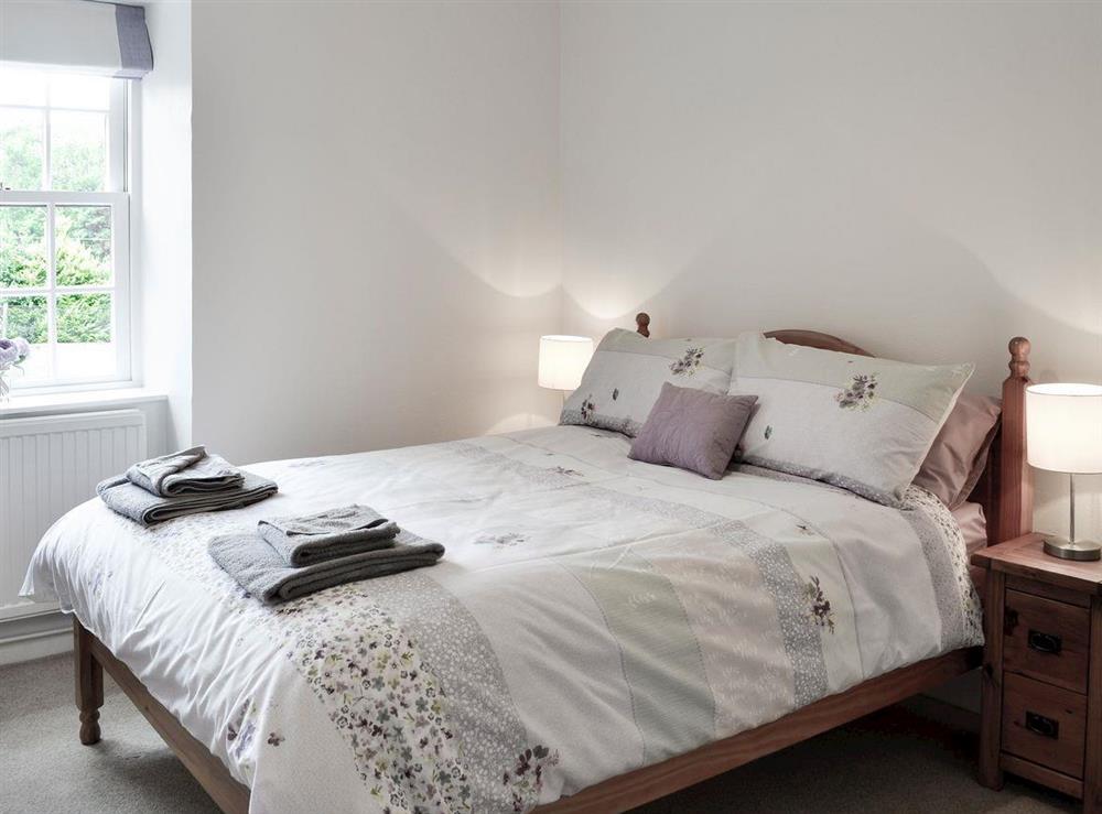 Elegant bedroom with double bed at Brow Cottage, 