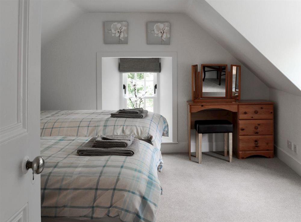 Peaceful bedroom with twin beds at Brow Cottage, 