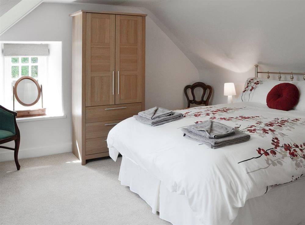 Tastefully furnished bedroom at Brow Cottage, 