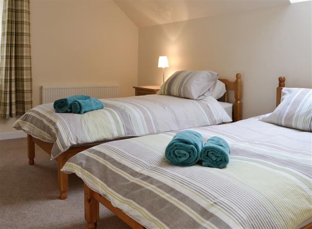 Comfortable twin bedroom at Home Farm Cottage, 