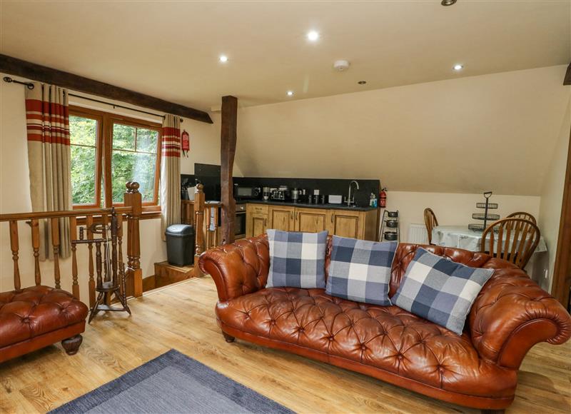 Relax in the living area at Glenmhor Apartment, Fort William