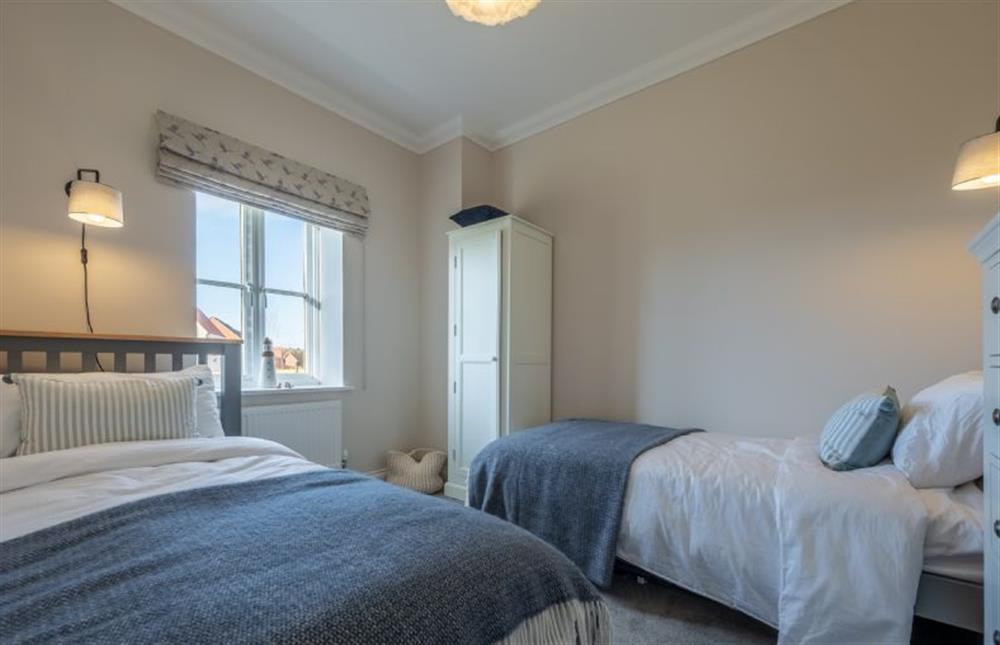 Ground floor: Bedroom two with 3ft single twin beds at Glimpse, Hunstanton