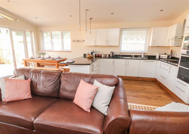 Relax in the living area (photo 2) at Gloccamaura, Bovey Tracey