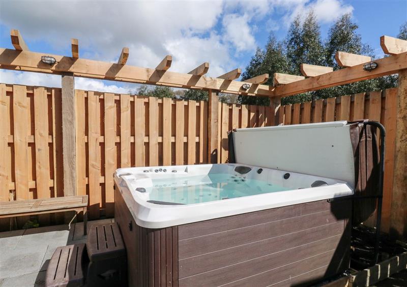 There is a hot tub at Gloccamaura, Bovey Tracey