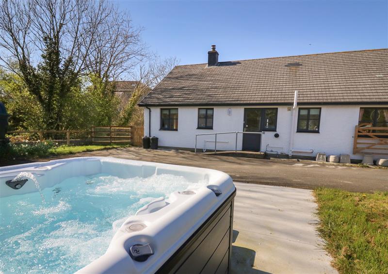 Enjoy the swimming pool at Glyn Cottage, Llanon
