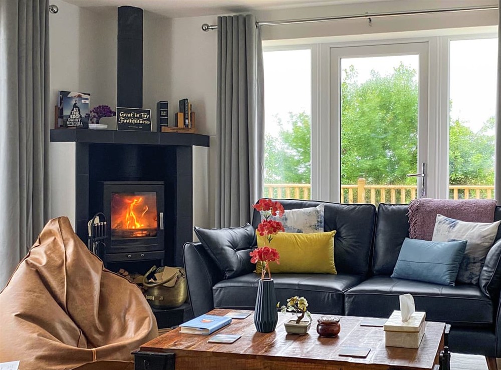 Relax by the fire. at Go Ye Cottage in Achmore, Isle Of Lewis