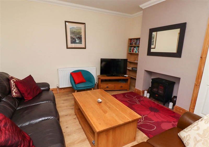Relax in the living area at Godetia Cottage, Seahouses