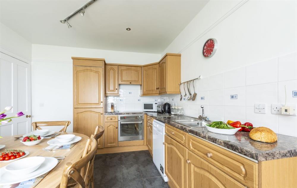 Ground floor: Fully-equipped kitchen with dining area at Godrevy, Lizard Lighthouse, The Lizard, Nr Helston