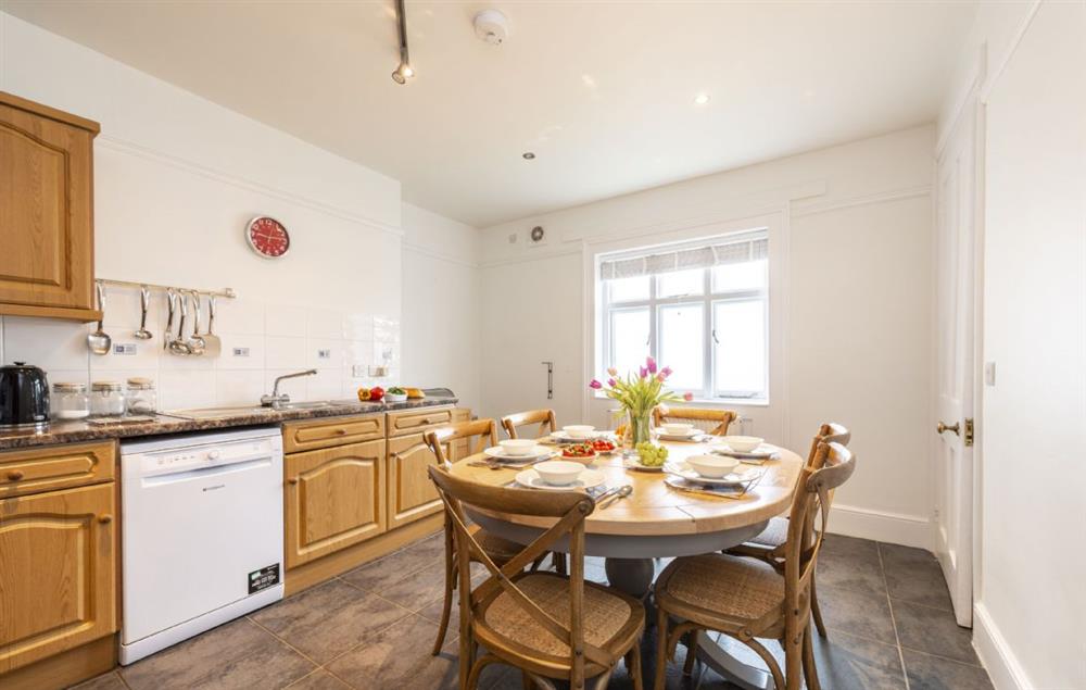 Spacious, fully-equipped kitchen with dining table seating six guests at Godrevy, Lizard Lighthouse, The Lizard, Nr Helston