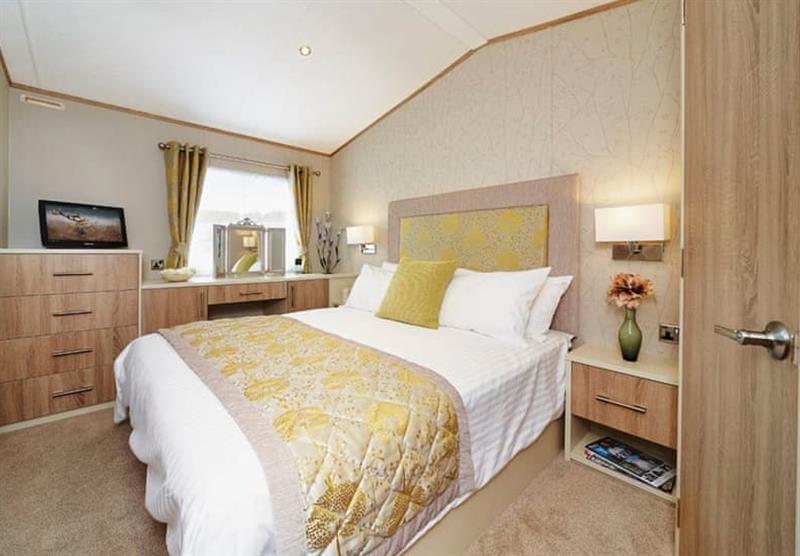Bedroom in the Helmsley Lodge at Golden Sands Holiday Park in Cresswell beach, Northumberland