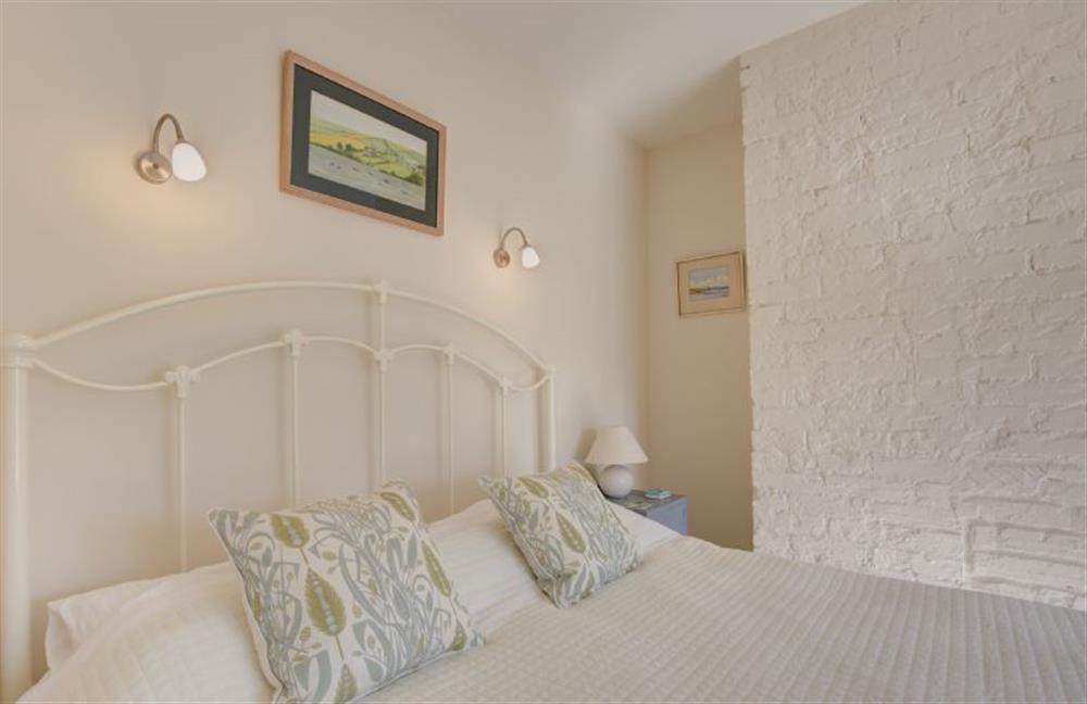 First floor: King-size bed at Goldfinch Cottage, Burnham Norton near Kings Lynn