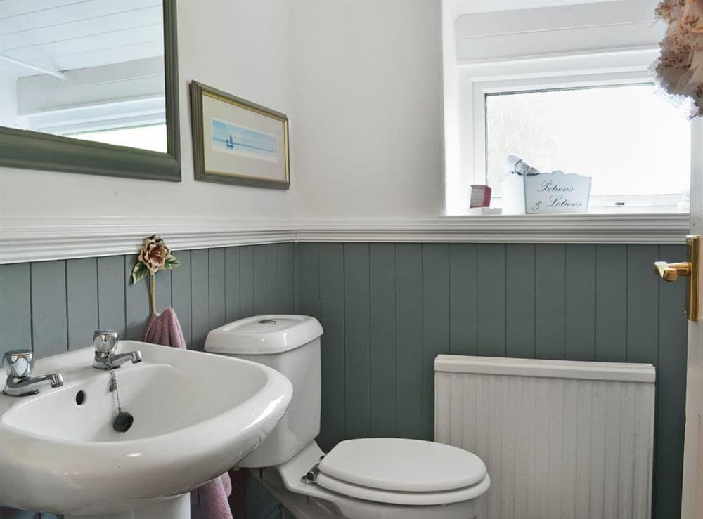 Bathroom with shower over bath at Golf Cottage  in Chapel-en-le-Frith, near Buxton, Derbyshire