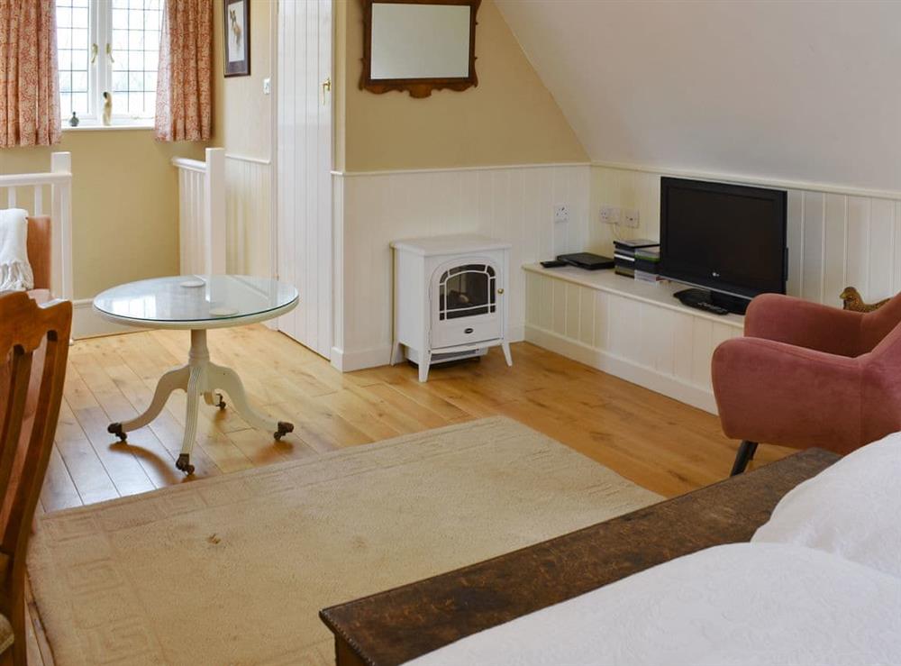 Comfy living area at Goodwood Coach House in Chichester, West Sussex