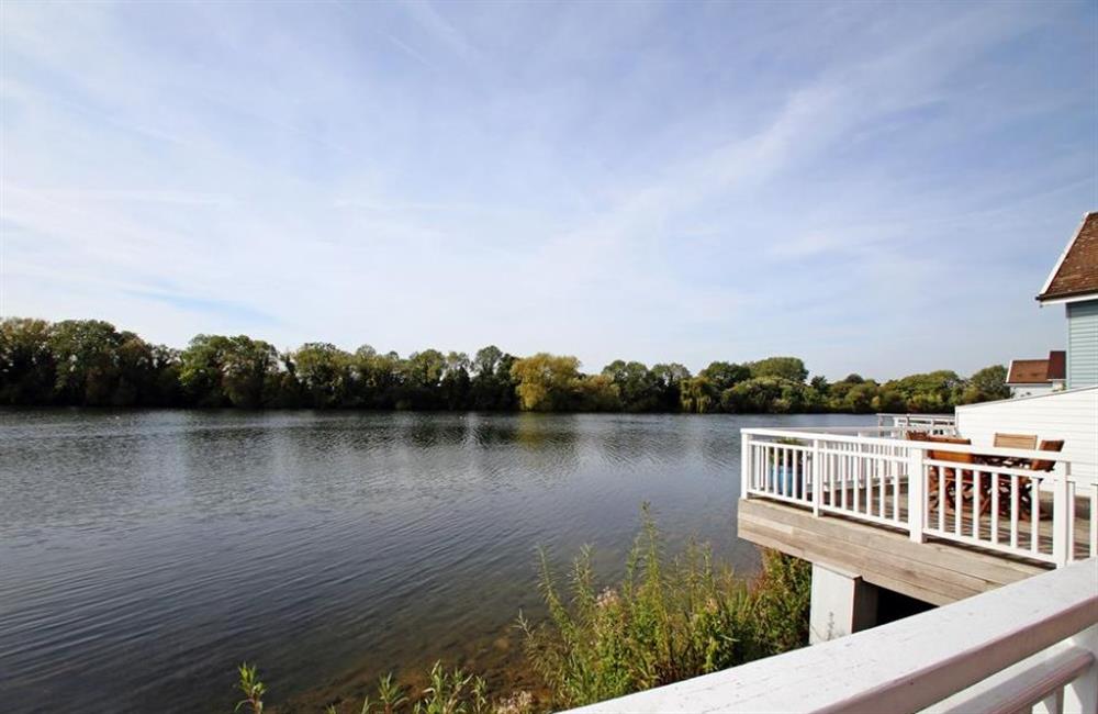 Views across the lake at Goosander Lake House, Cotswold Lakes, Gloucestershire