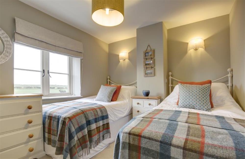 First floor: Bedroom two, twin room at Goose Cottage, Titchwell near Kings Lynn