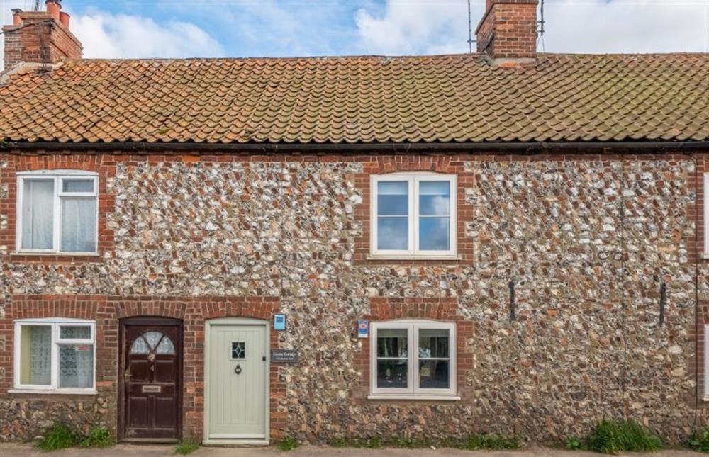 Goose Cottage with the sage green door  at Goose Cottage, Titchwell near Kings Lynn