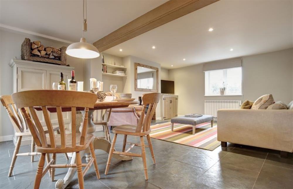 Ground floor: Dining area leading to Sitting room at Goose Cottage, Titchwell near Kings Lynn