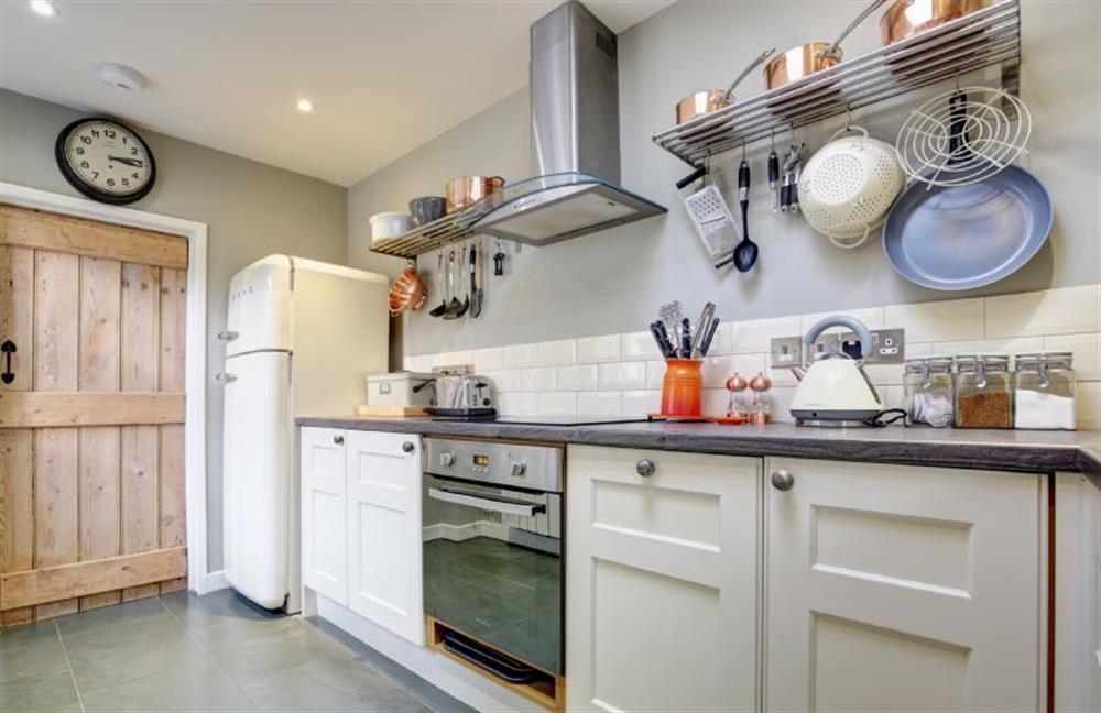 Ground floor: Kitchen with Smeg American style fridge / freezer at Goose Cottage, Titchwell near Kings Lynn
