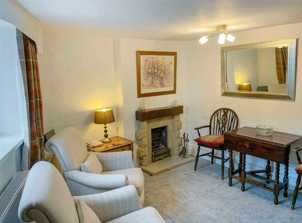 Cosy living/dining room (photo 2) at Goose Green Cottage in Baslow, near Bakewell, Derbyshire