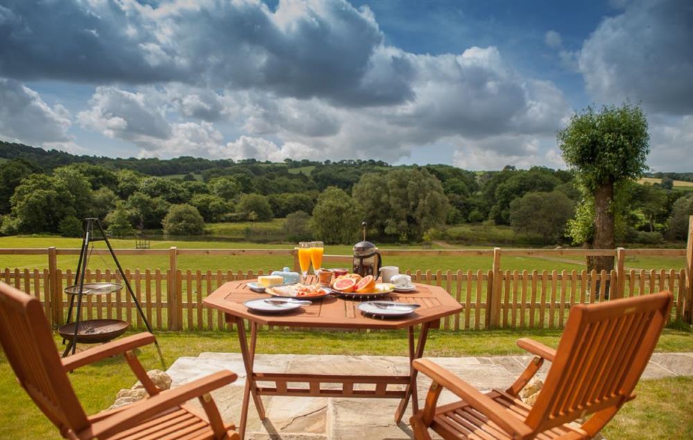 Enjoy breakfast af fresco on the terrace at Goose Run Cottage, Corscombe