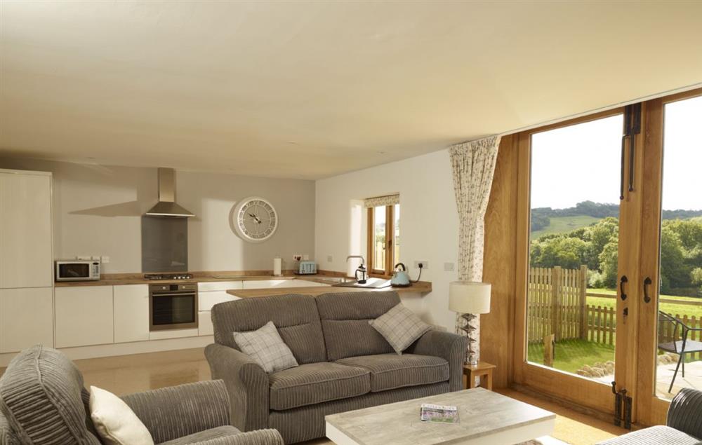 Large open-plan kitchen, dining and sitting room at Goose Run Cottage, Corscombe